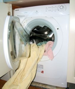 Clothes Dryer with clothes hanging out